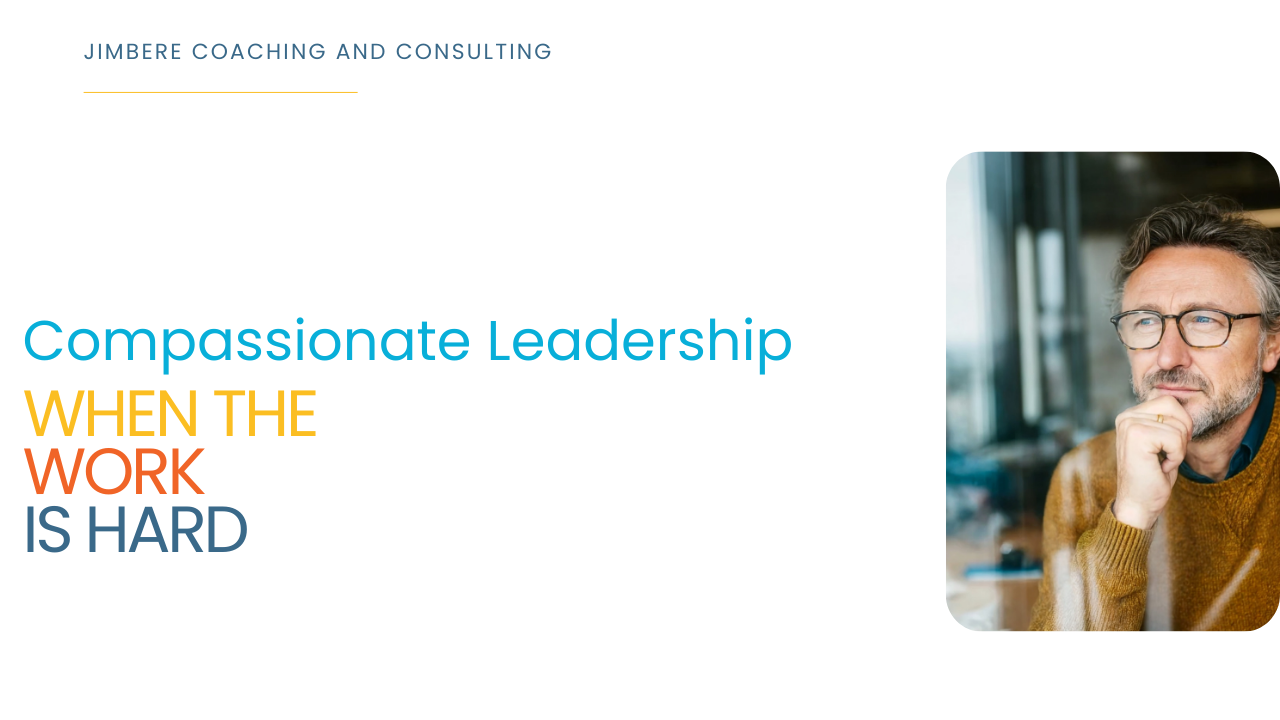 A professional man reflecting and looking outside the window. Article title and invitation to read Compassionate Leadership When the Work Is Hard.